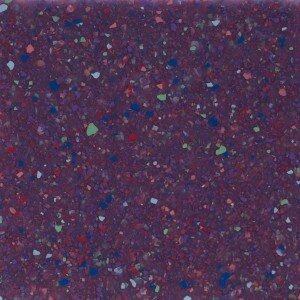 Purple surface with red, blue and green speckles