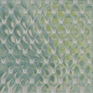 Translucent geometric pattern with diamond shapes and light green tints