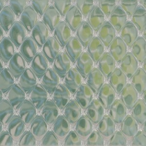 Translucent geometric pattern with diamond shapes and light green tints