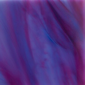 Deep purple and blue swirled marble texture