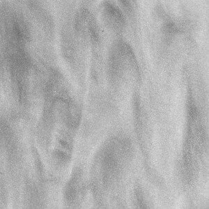 Silver textured surface with uneven patterns