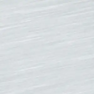 Close-up of a light gray textured surface with a smooth, matte finish and subtle diagonal striping patterns