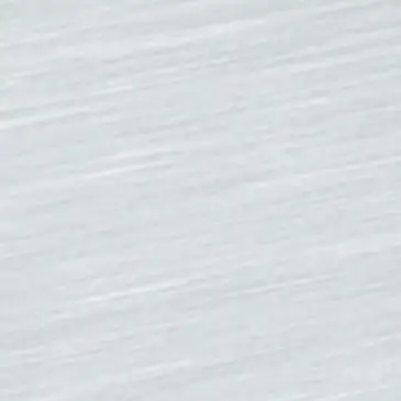Close-up of a light gray textured surface with a smooth, matte finish and subtle diagonal striping patterns