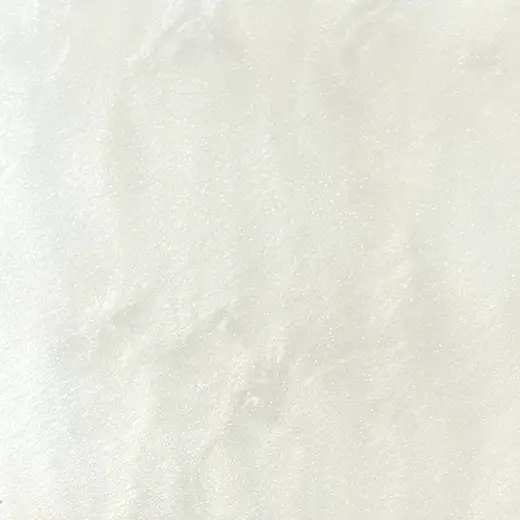 Close-up of a Pearl Classic White Acrylic Sheet with a smooth, pearlescent finish and subtle swirling patterns.